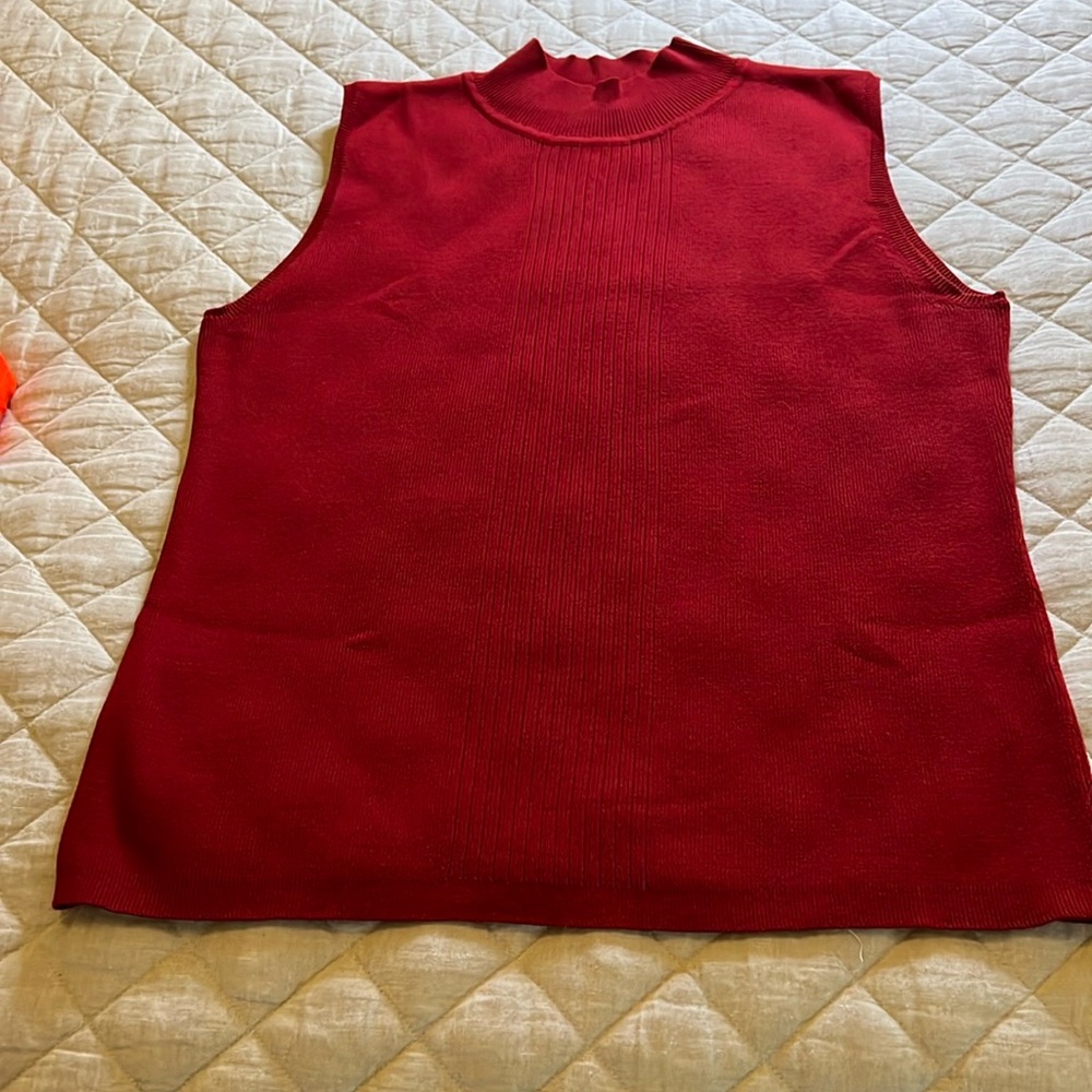 Red mock turtle neck knit shell with woven stripe pattern down the bodice